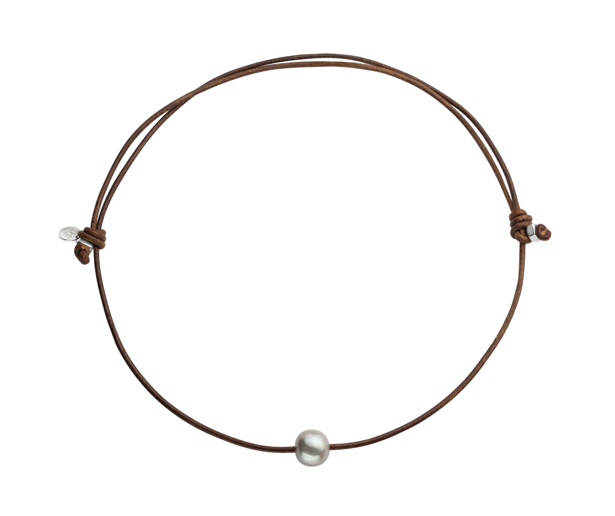 collar ajustable perla grande con cuero