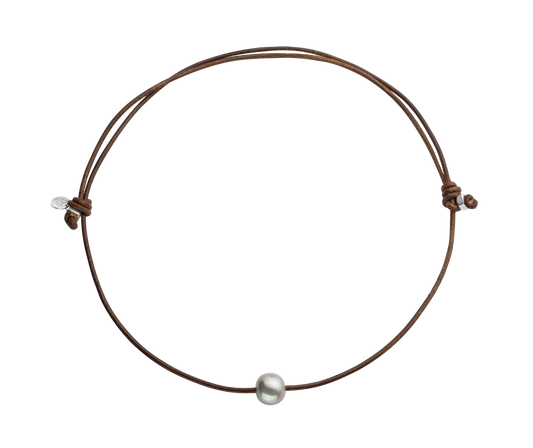 collar ajustable perla grande con cuero